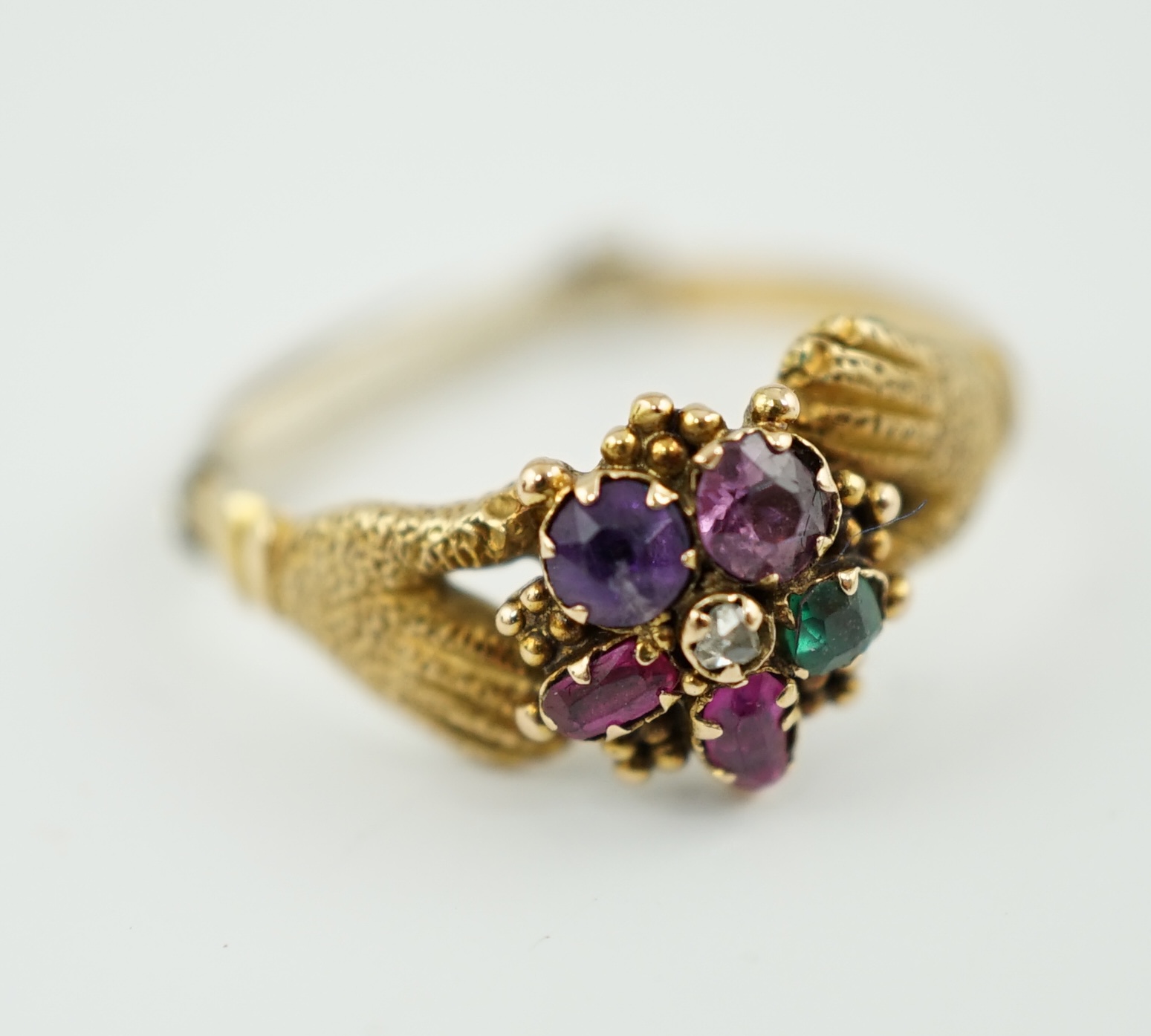 A late Victorian 15ct gold 'Regard' ring, modelled as two hands clutching a flower head, size K, together with a 15ct gold and seed pearl bar brooch, modelled as a frog upon bulrushes